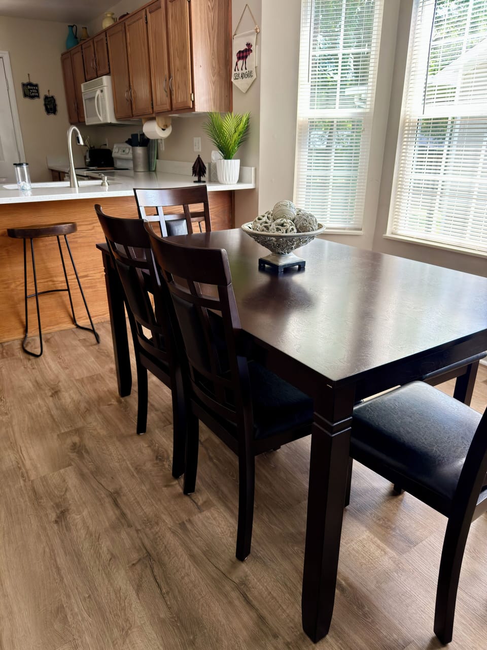 Dining table with 4 chairs and a padded bench for 2