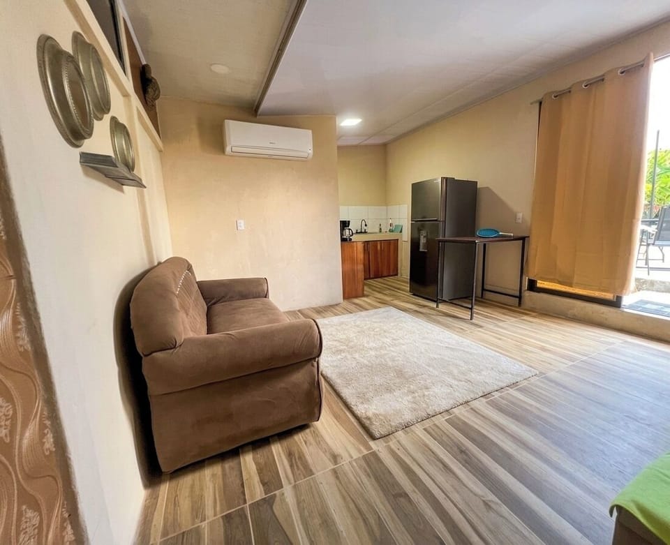 Family Apartment, Pool View | Living area