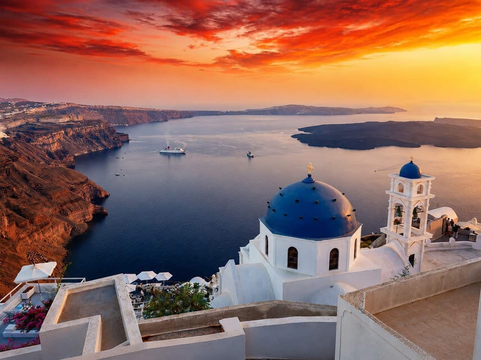 Only 600m from Imerovigli — experience the iconic Santorini sunset, breathtaking caldera views, and the famous blue-domed churches.