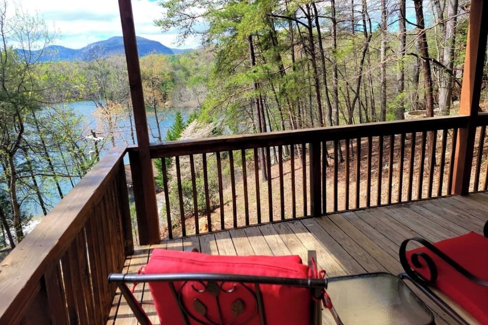 Enjoy sitting on the deck overlooking the lake and beach with huge Chimney Rock Mountain Views!