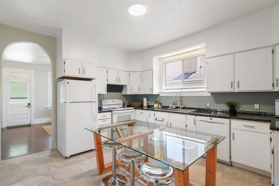 Our bright, spacious kitchen is fully equipped with full-size appliances
