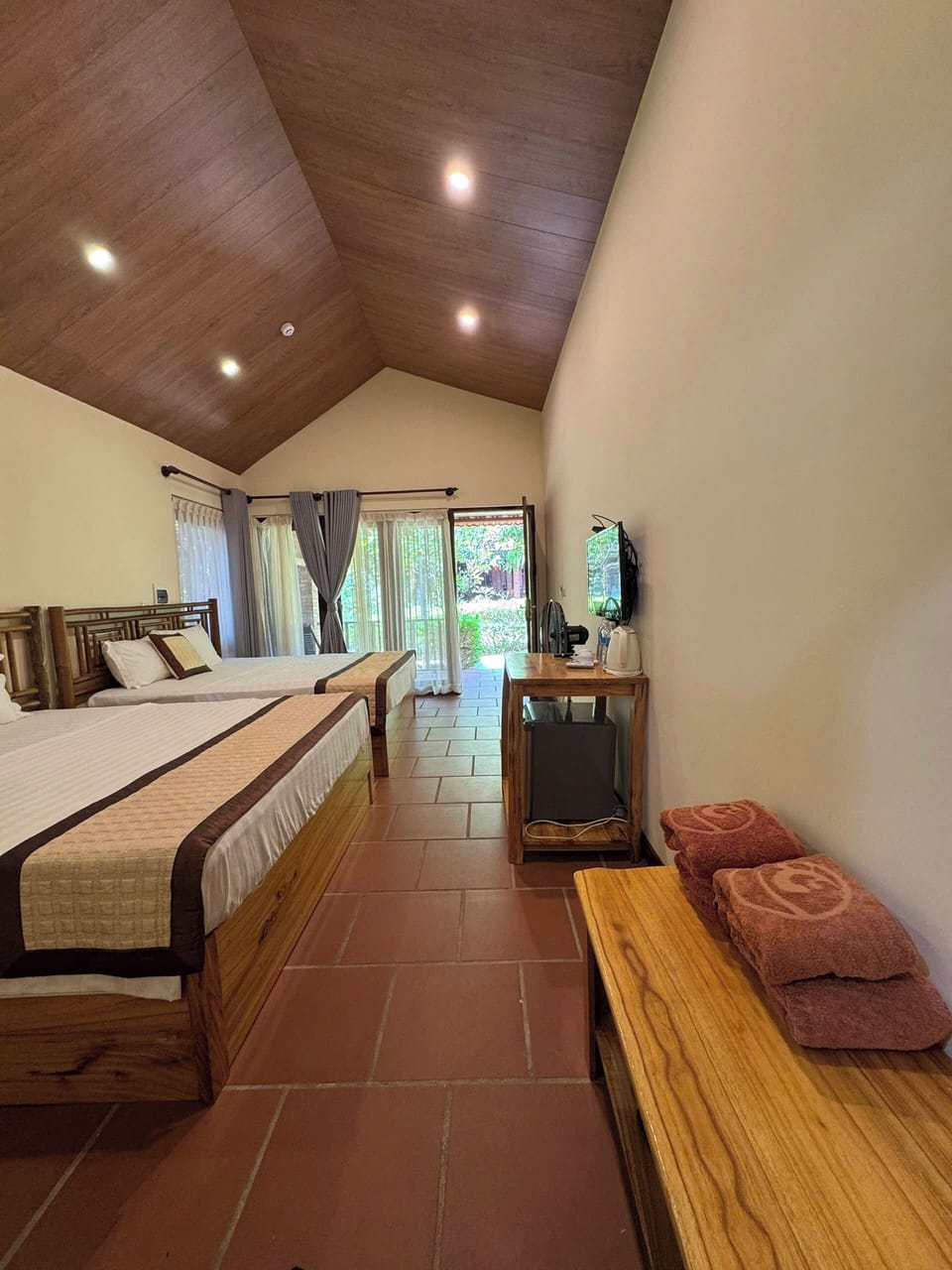 Family Room, Pool View | Pillowtop beds, minibar, free WiFi, bed sheets
