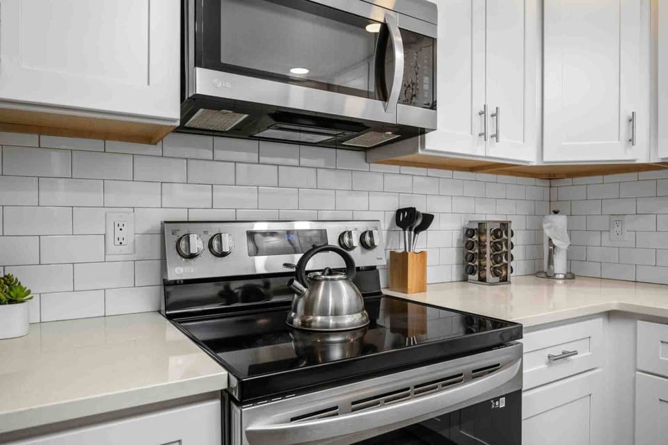 Modern kitchen with sleek appliances and plenty of counter space.