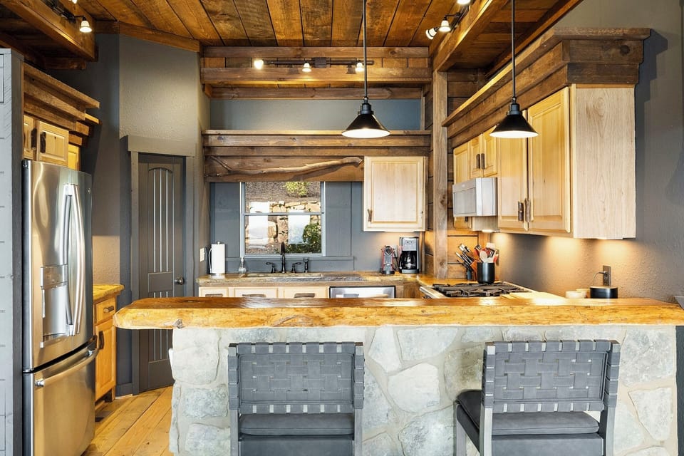 Pull up a stool at the stone-clad bar while coffee brews behind you. There's counter space for three cooks and everyone else to keep them company.