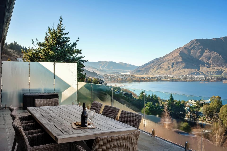 Spacious outdoor decking with BBQ, dining table and chairs.