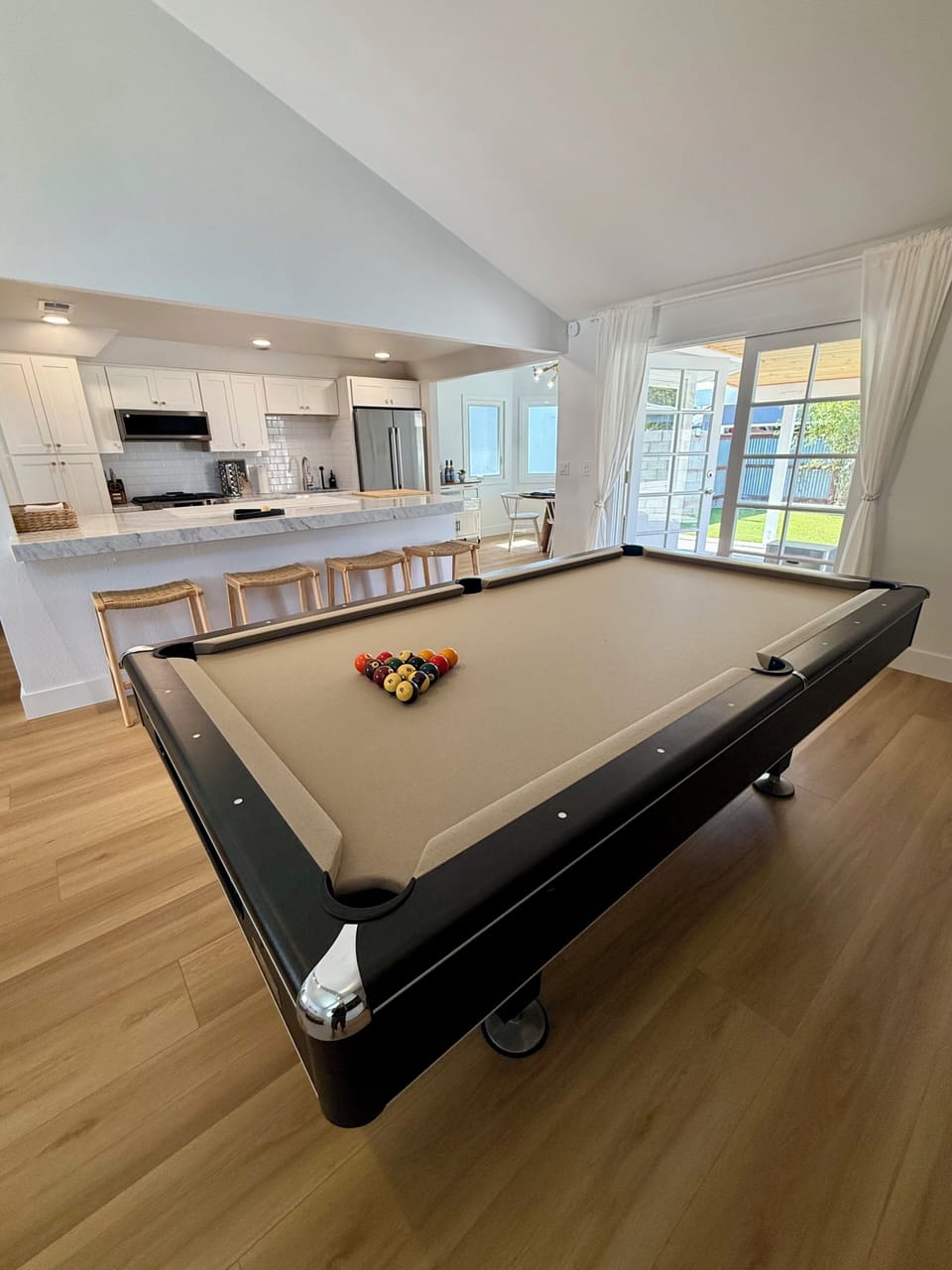8ft size pool table located in the great room.