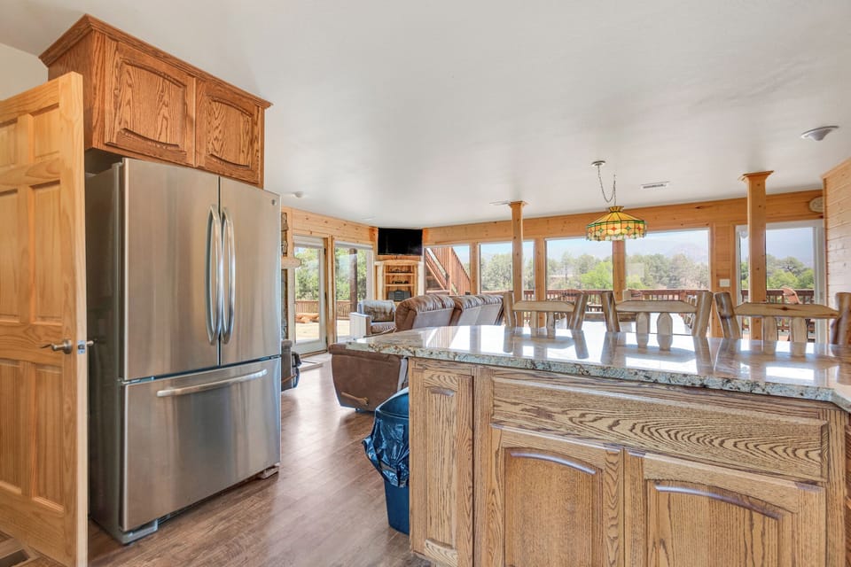 Kitchen
•Open to Main Living Area
•Full Size Refrigerator