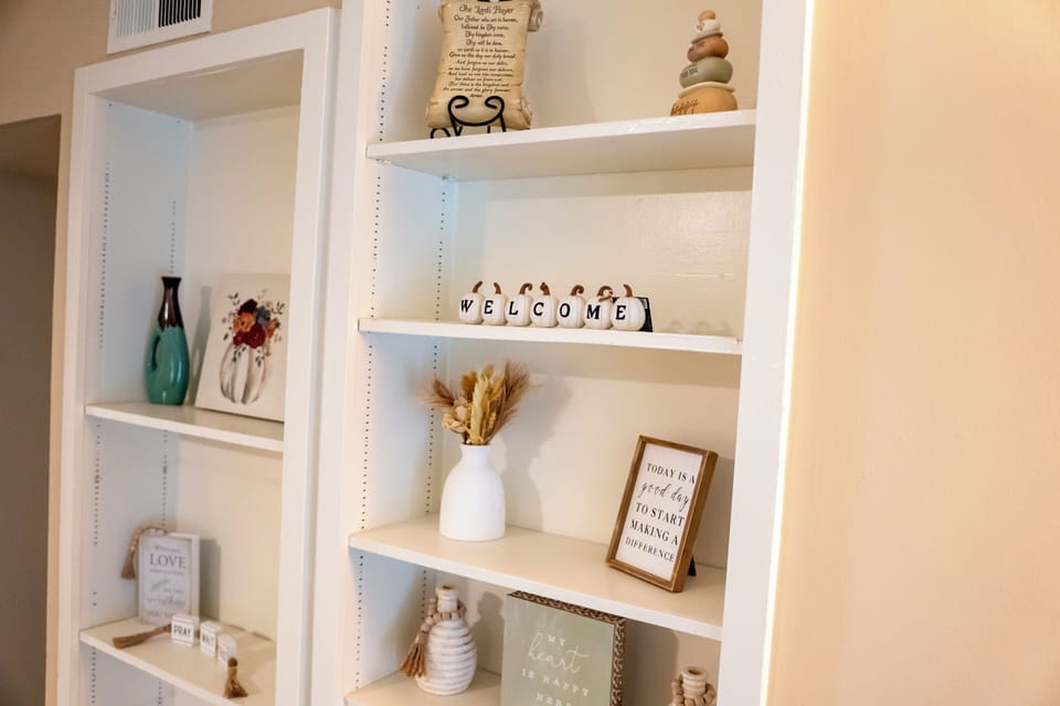 Charming built-in shelves with warm decor and a welcoming touch