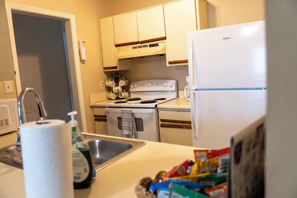 Bright, fully equipped kitchen with full-size appliances and ample counter space