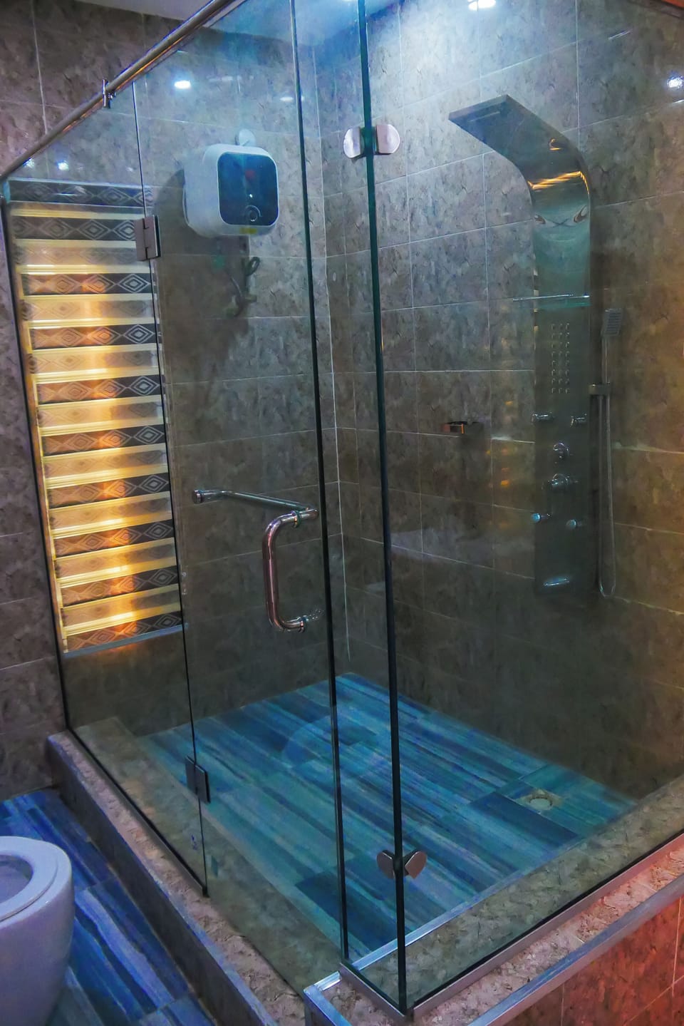 Shower, towels, soap, toilet paper