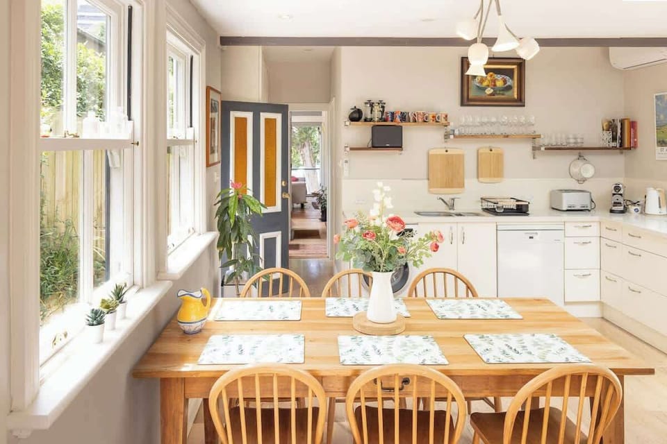 Dinning table along the all day sunlit windows