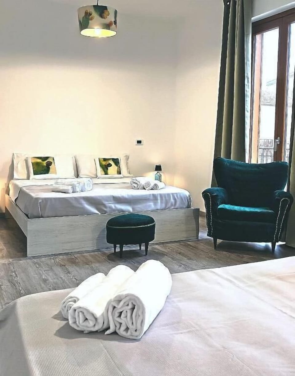 Deluxe Quadruple Room, Balcony, City View | Desk, laptop workspace, WiFi (free)
