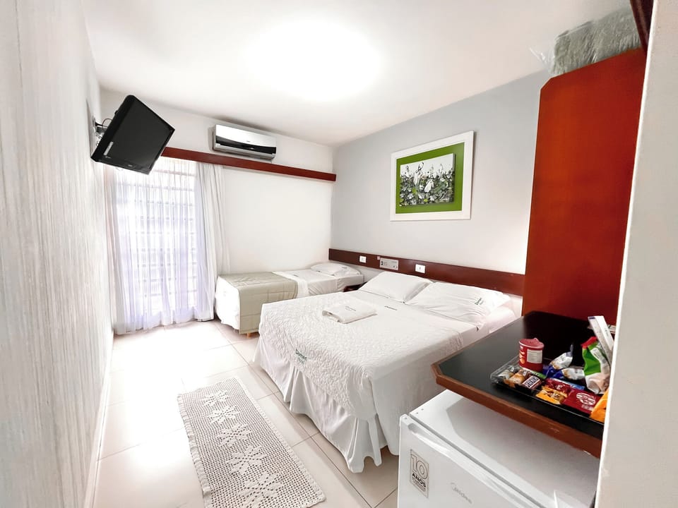 Standard Triple Room | Minibar, desk, blackout drapes, free WiFi