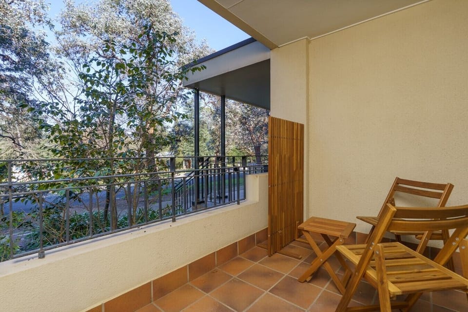 Start your morning with a coffee or wind down with a glass of wine on the private balcony overlooking tranquil greenery.