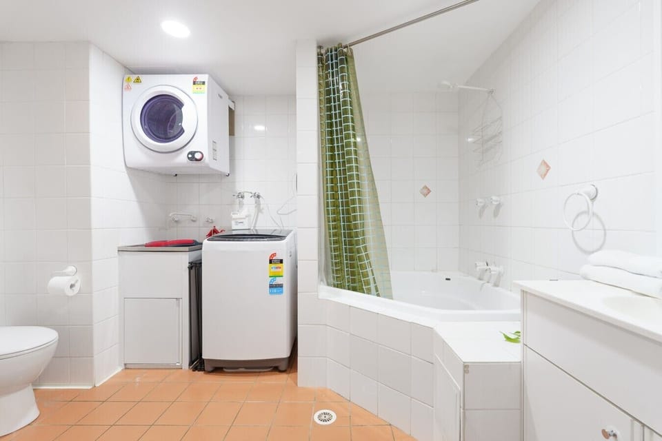 Enjoy the convenience of a spacious bathroom with a full-sized bath, separate shower and internal laundry facilities.