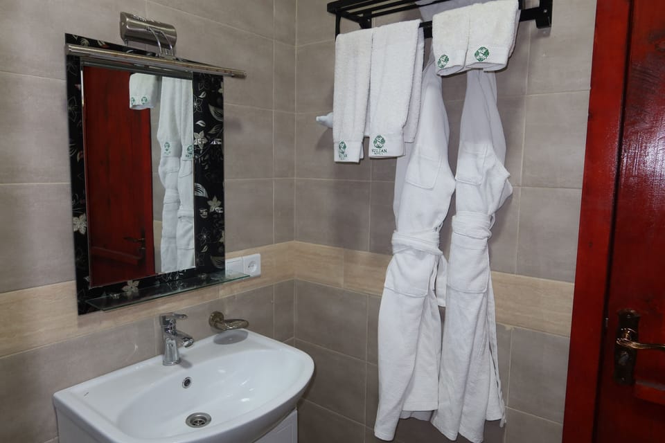 Comfort Twin Room, Courtyard View | Bathroom | Shower, hair dryer, towels, soap