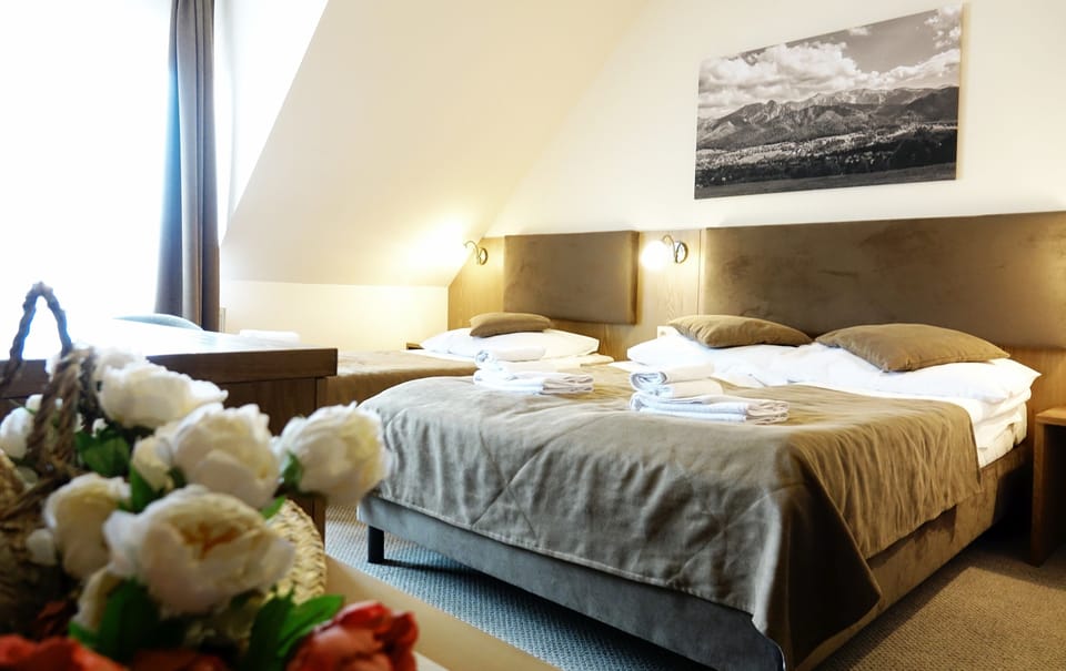 Premium bedding, desk, iron/ironing board, rollaway beds