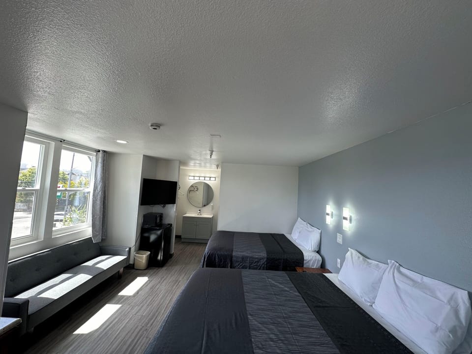 Room, 2 Queen Beds, Non Smoking | Free WiFi, bed sheets, wheelchair access