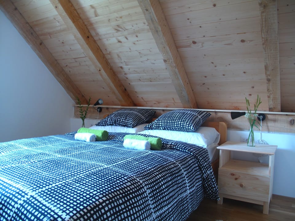 Double Room (Attic) | Down comforters, individually decorated, blackout drapes, free WiFi