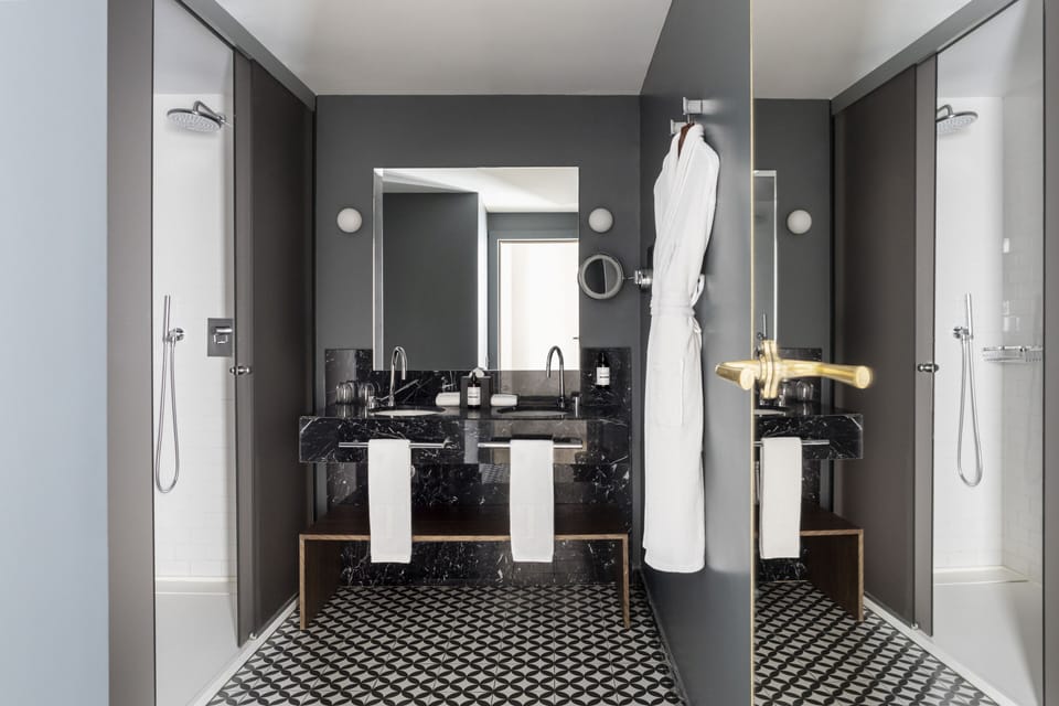 Shower, rainfall showerhead, eco-friendly toiletries, hair dryer