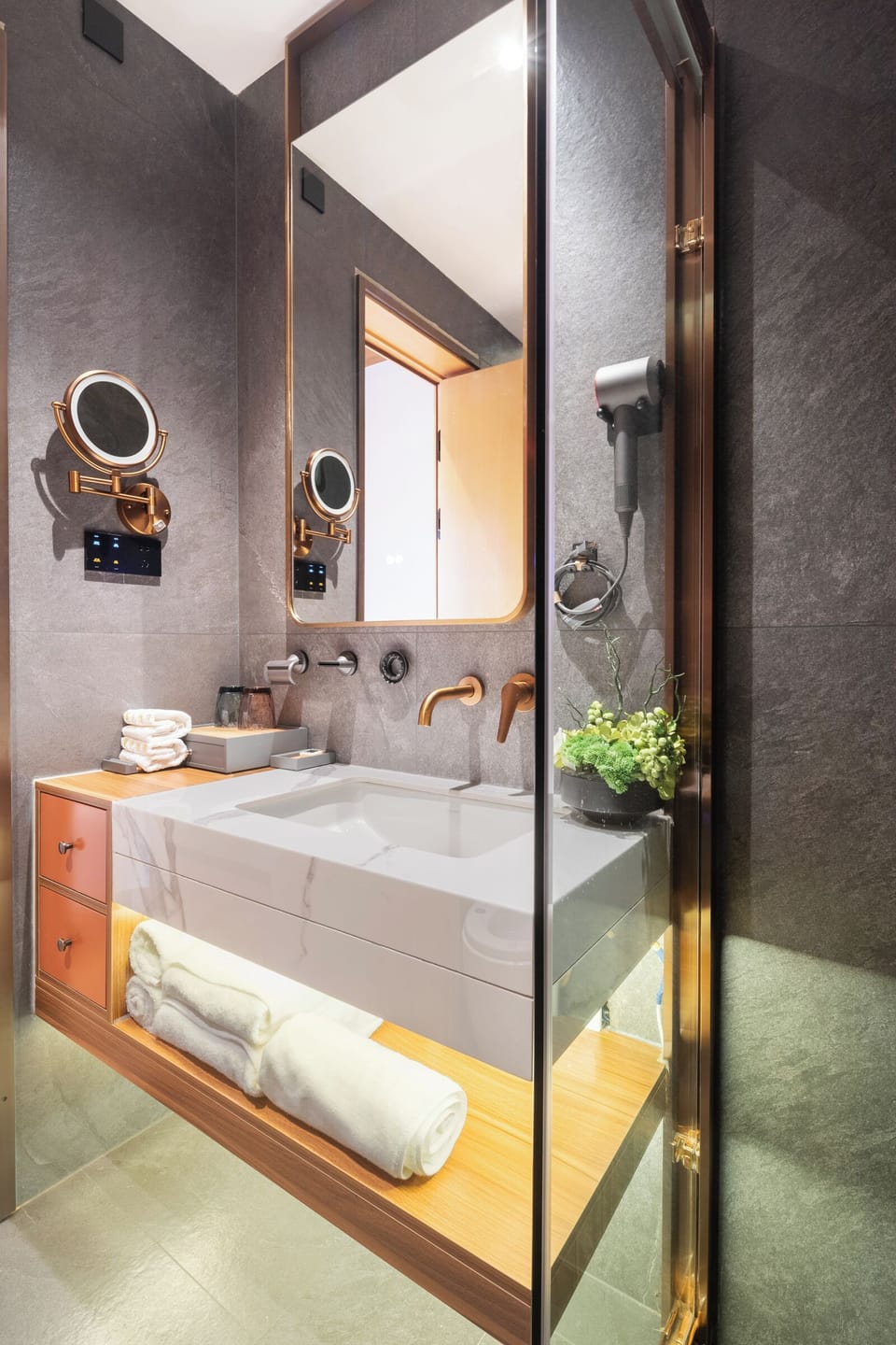 Family Room with One Queen Bed and One Single Bed | Bathroom | Shower, free toiletries, hair dryer, slippers