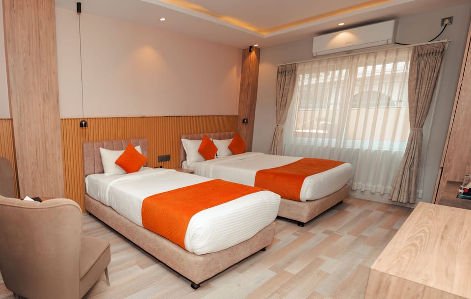 Deluxe Room | Premium bedding, in-room safe, desk, laptop workspace