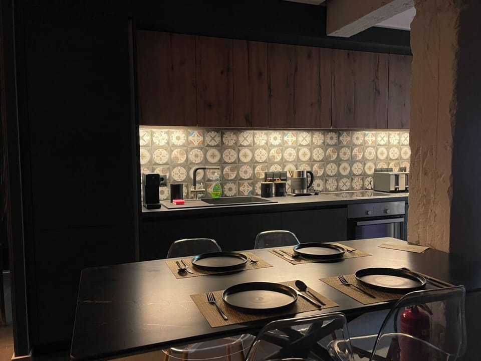 Deluxe Apartment | Private kitchen | Espresso maker, coffee/tea maker, full-size fridge, oven