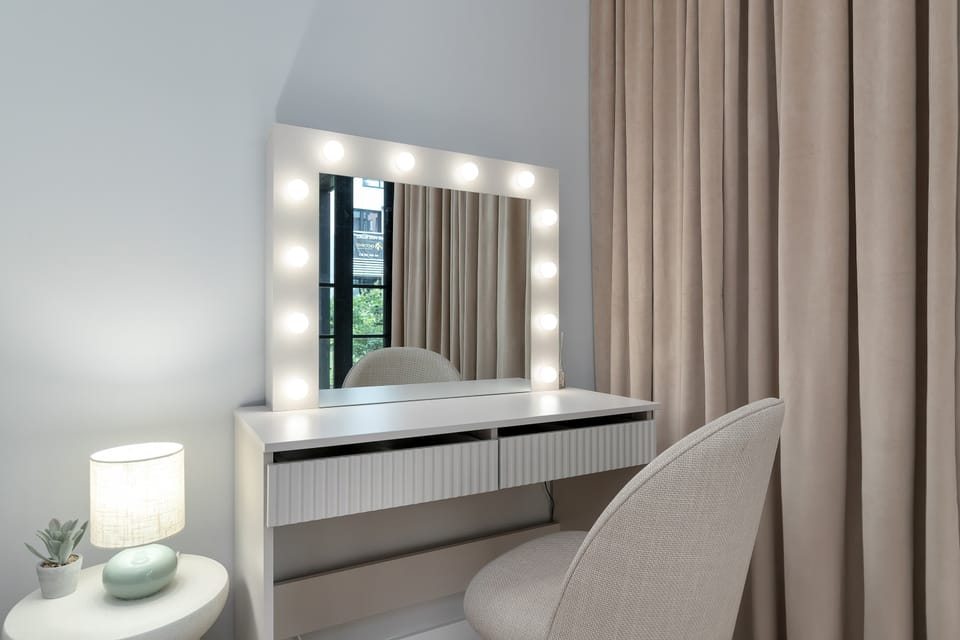 The bedroom's modern design ensures a comfortable stay.