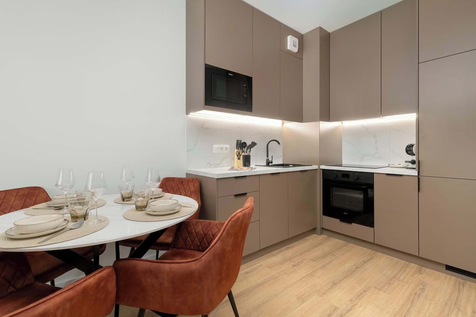The fully equipped kitchenette includes everything you need for a home-cooked meal.
