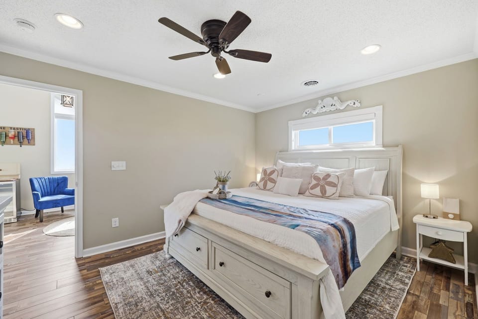 Enjoy peaceful nights in the comfortable king bed after unwinding with music and a glass of wine nearby.