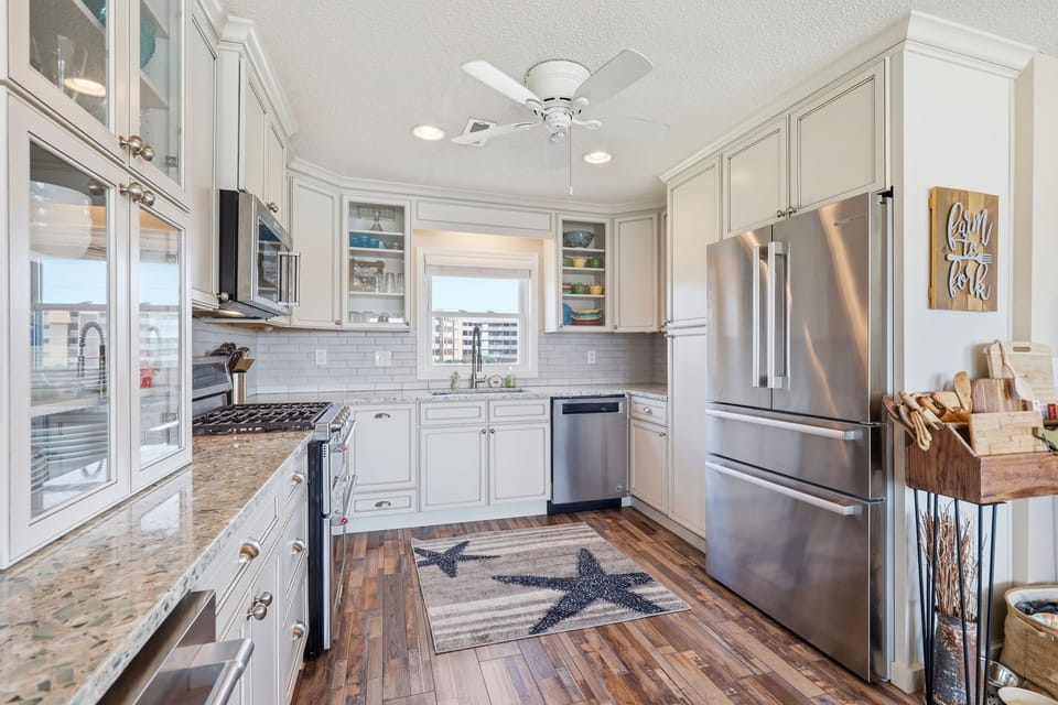 A charming country-inspired kitchen with timeless coastal style