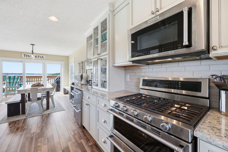 Updated appliances and a gas range make cooking a breeze.