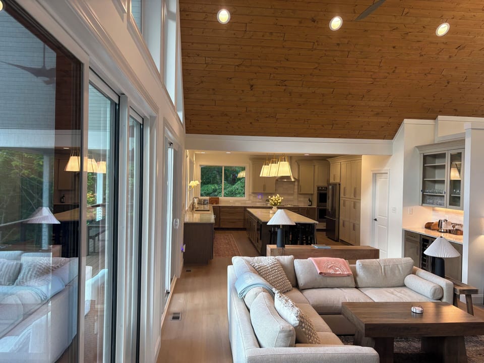 Vaulted ceilings, gourmet kitchen, and seamless open living