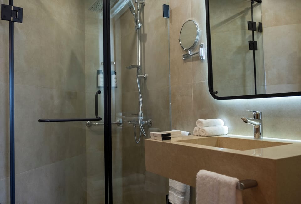 Family Suite, Mountain View | Bathroom | Shower, hair dryer, slippers, towels