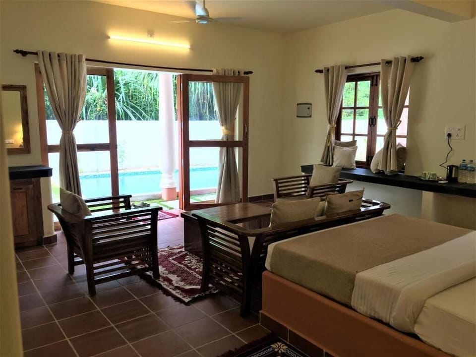 Deluxe Double Room, Balcony, Pool View | In-room safe, blackout drapes, soundproofing, WiFi (free)