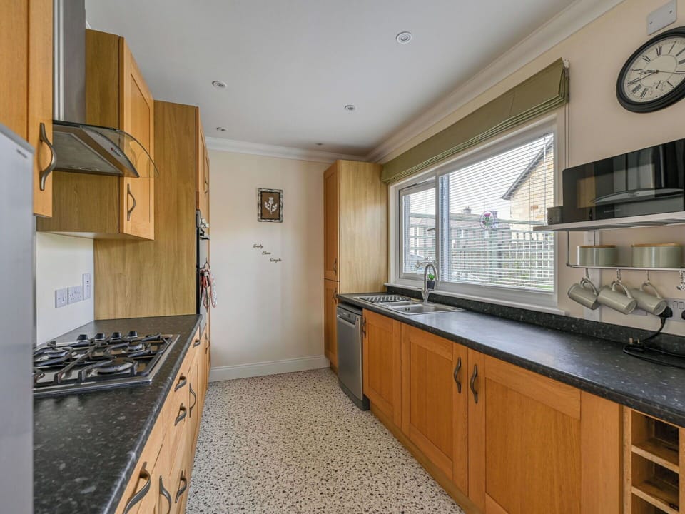 Kitchen, Countertop, Cabinetry, Interior Design, Flooring, Kitchen Appliance, Major Appliance, Wood, Floor, Ceiling