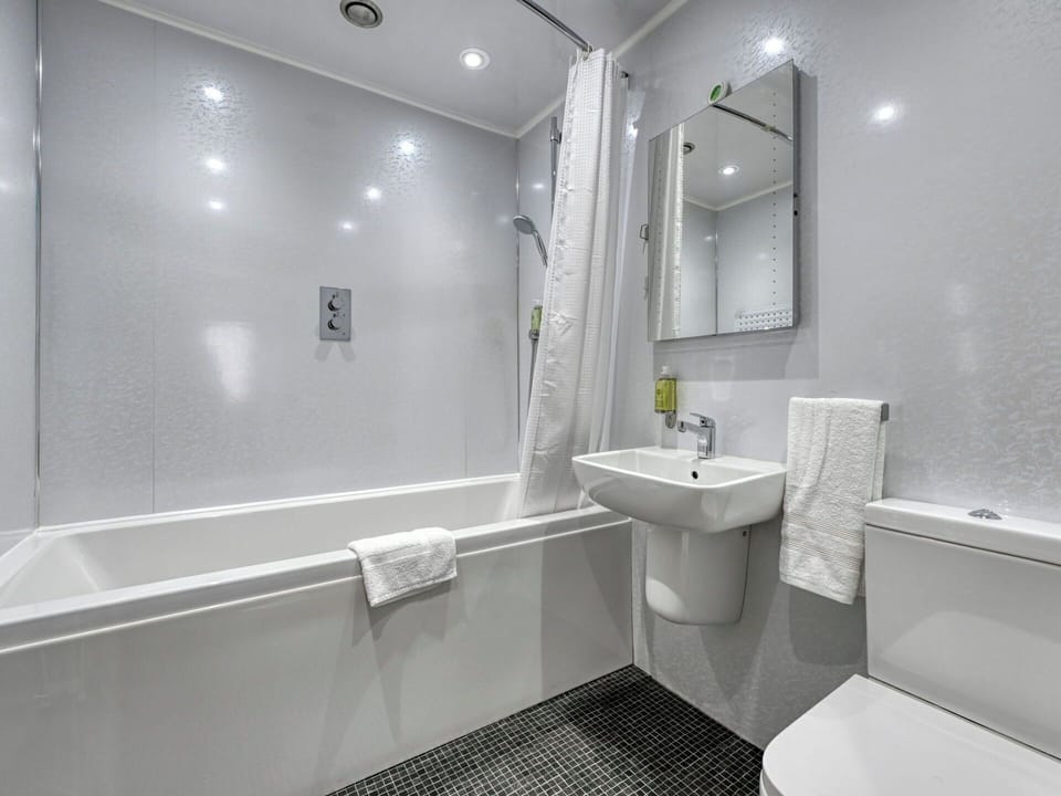 Bathroom, Interior Design, Plumbing Fixture, Flooring, Floor, Ceiling, Plumbing, Bathtub, Shower, Tile
