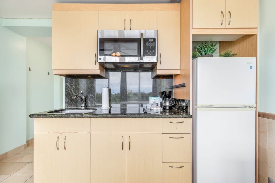 Your kitchenette is equipped with everything you need to prepare light meals and enjoy morning coffee. The full-size refrigerator, microwave, and coffee maker make self-catering convenient.