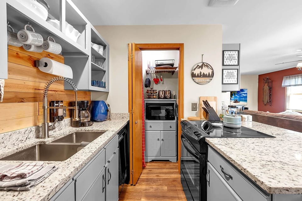 Coffee bar, stocked kitchen, and convenient main-level laundry