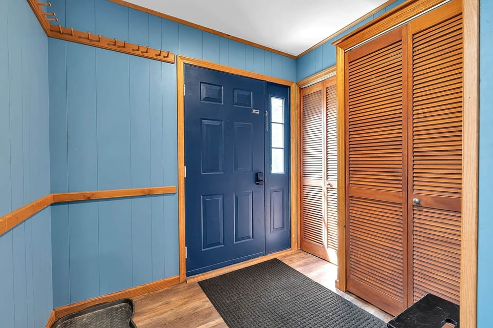 Entry mudroom with space to store skis, snowboards, bikes, boots, and outdoor gear