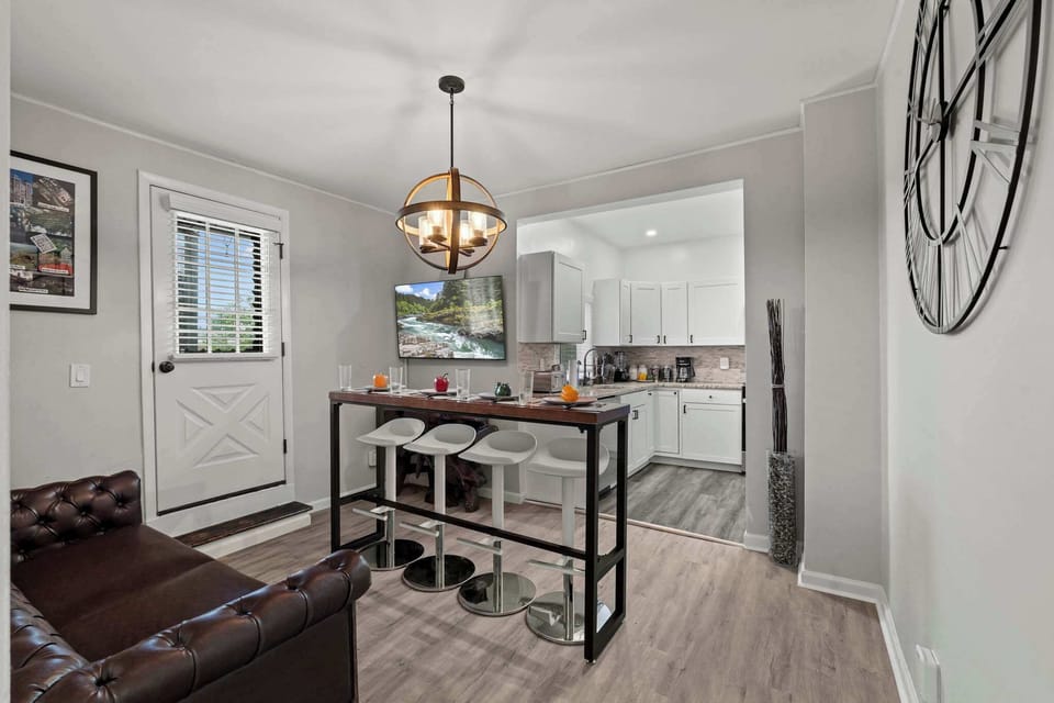 Open kitchen wall so you can walk from living/dining room straight into the kitchen - the door on the left leads to the large main deck and around the kitchen on the right is the rear deck.
Virtual tour: bit.ly/660VU2
Video tour: youtu.be/UnEWdFCqhSY