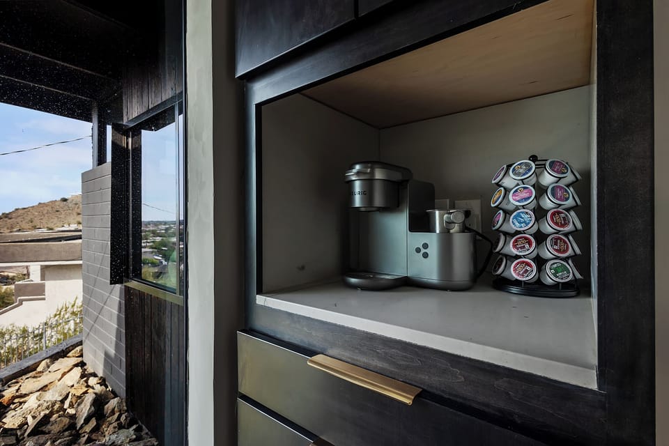 Built-in coffee bar with Keurig & pods, sip with mountain views
