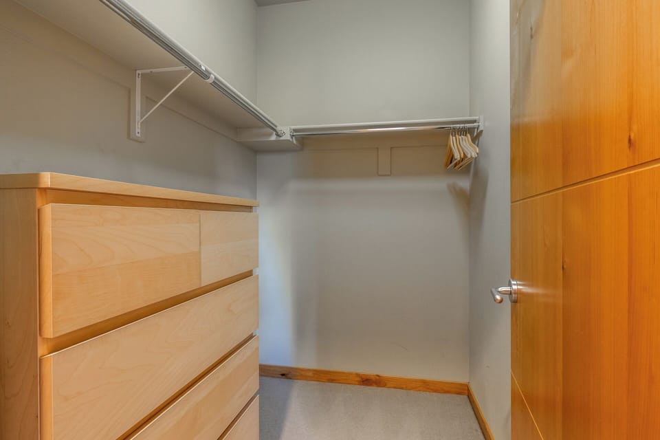 Unpack and settle in with ease—your spacious walk-in closet offers hanging rods and dresser drawers, giving you plenty of room to organize your wardrobe.