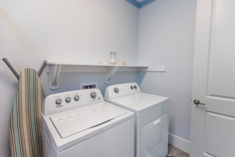 Your own in-unit laundry room keeps clothes fresh effortlessly, with a washer, dryer, and folding space making longer stays worry-free.