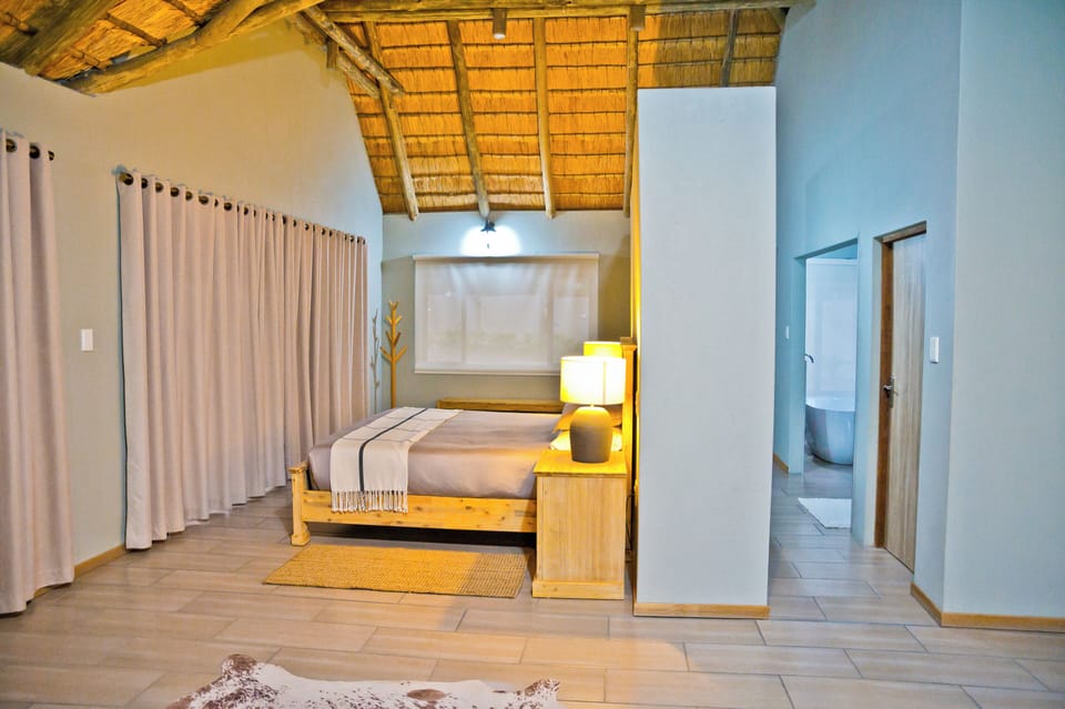 Luxury Suite, Patio, Garden View | In-room safe, desk, laptop workspace, soundproofing