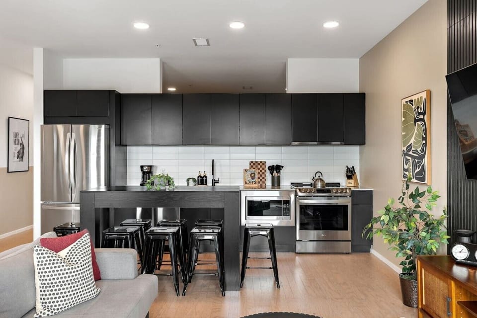 Fully equipped, modern-appliance kitchen for all of your cooking needs! Coffee machine + coffee provided. Seating for 8 at the high-top table, and seating for 4 at the dining table.
