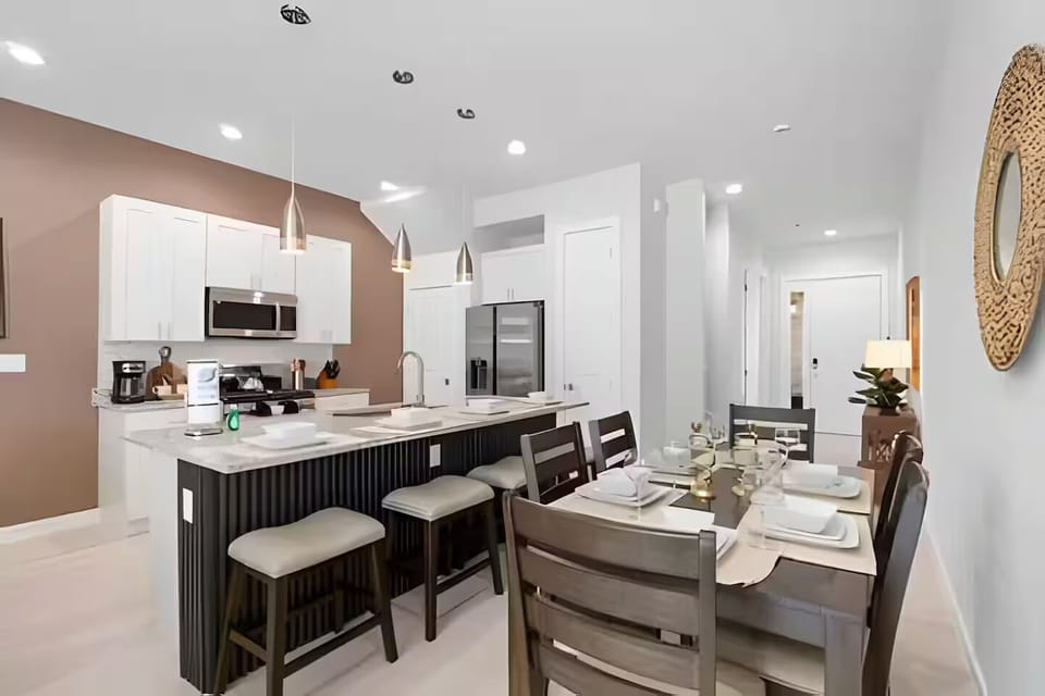 Spacious kitchen and dining setup, perfect for casual dining or gatherings.