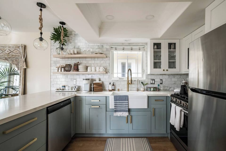 Newly renovated kitchen.  Farmhouse sink, Kohler faucets, filtered drinking water, floating shelves, microwave, dishwasher, ice maker, gas range.  Keurig coffee machine and cuisinart coffee.Fully stocked kitchen makes it easy for preparing meals.
