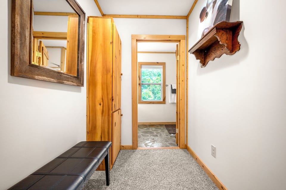 Full bathroom located on the upper level of the cabin