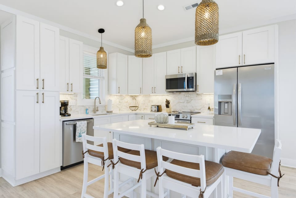 Bright white kitchen with everything the family or hired Chef needs!